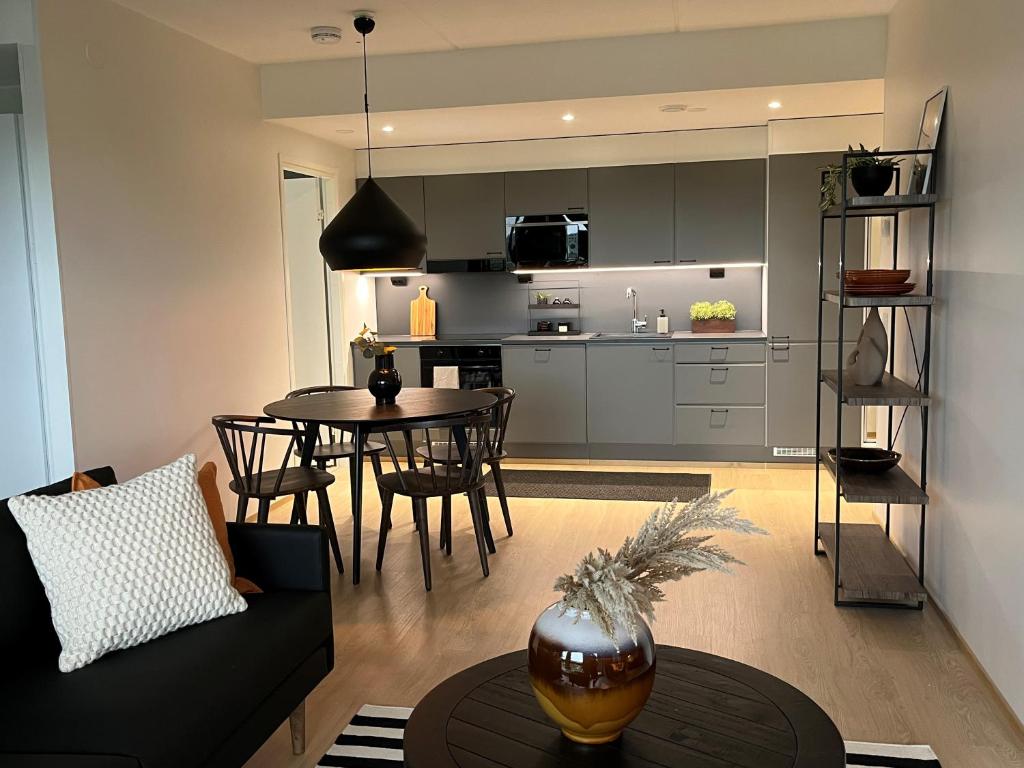 Kuchyň nebo kuchyňský kout v ubytování Tikka Apartments