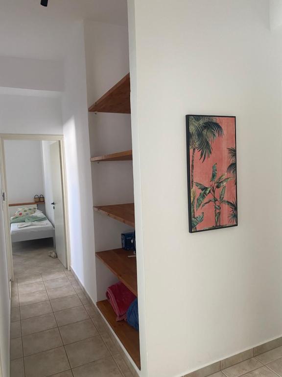 Postel nebo postele na pokoji v ubytování MARGARITA STUDIOS
