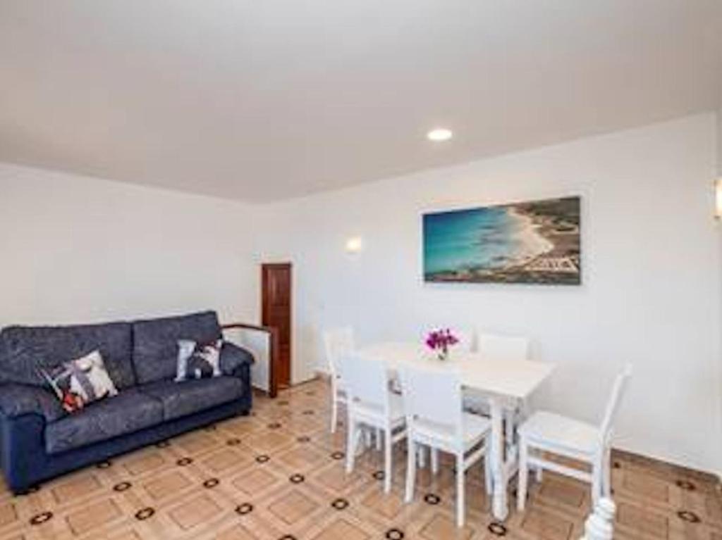 A seating area at Great Son Bou Villa Casa Lucia 3 Bedroom Family Villa Large Spacious Pool Area Sea Views