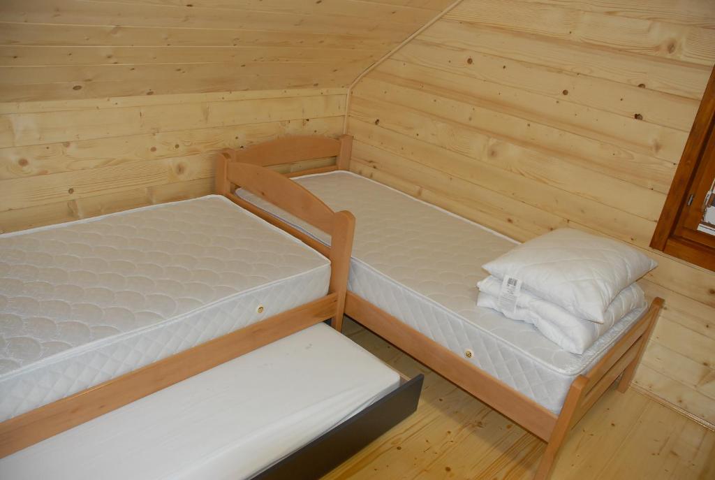 Postel nebo postele na pokoji v ubytování Planinska kuća Jovanić
