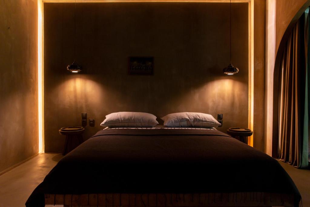 Postel nebo postele na pokoji v ubytování Life Gallery Hotel & Spa