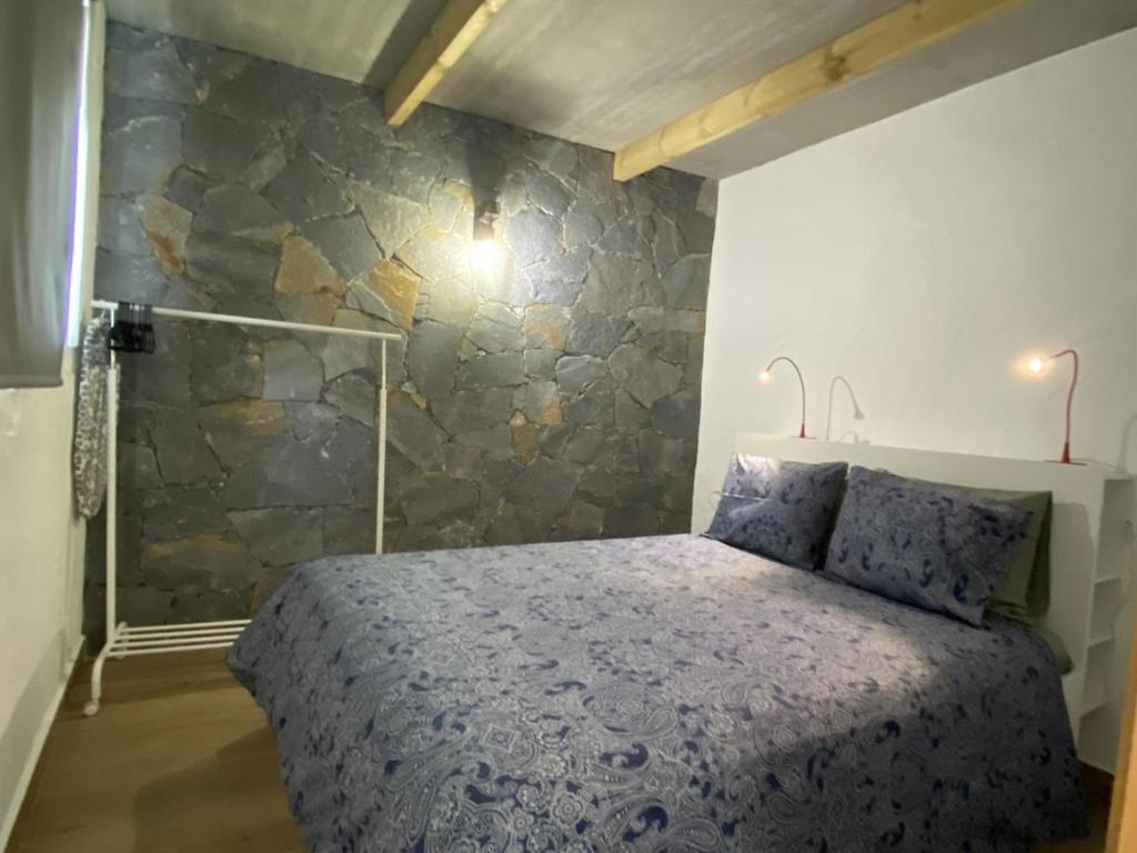 Postel nebo postele na pokoji v ubytování Casa de La Maceta