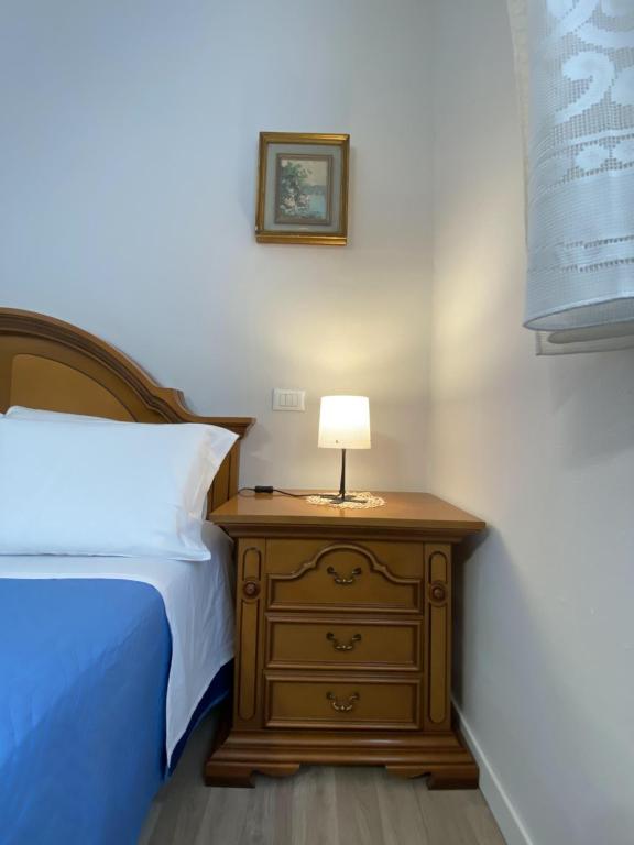 Postel nebo postele na pokoji v ubytování Albergo Lodrino