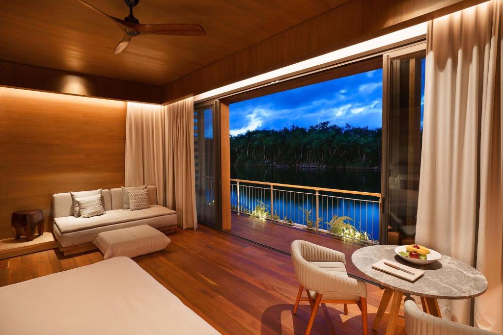 Postel nebo postele na pokoji v ubytování Banyan Tree Mayakoba