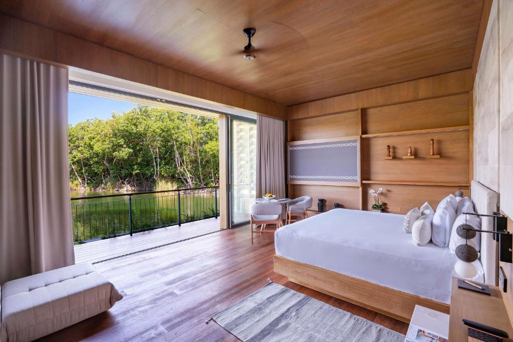 Postel nebo postele na pokoji v ubytování Banyan Tree Mayakoba