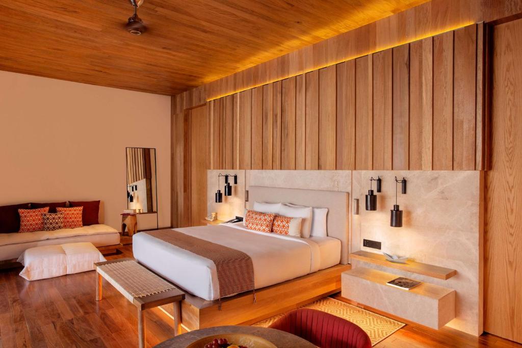 Postel nebo postele na pokoji v ubytování Banyan Tree Mayakoba