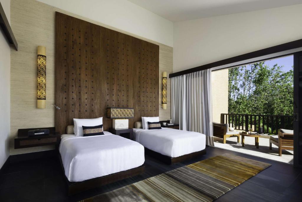 Postel nebo postele na pokoji v ubytování Banyan Tree Mayakoba
