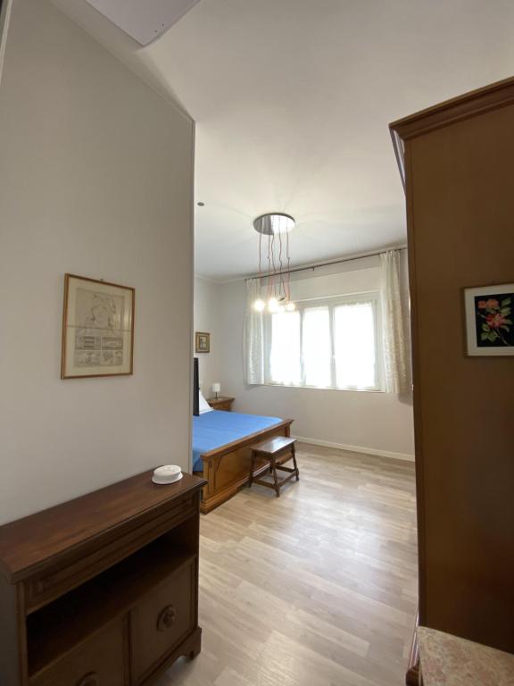 Postel nebo postele na pokoji v ubytování Albergo Lodrino
