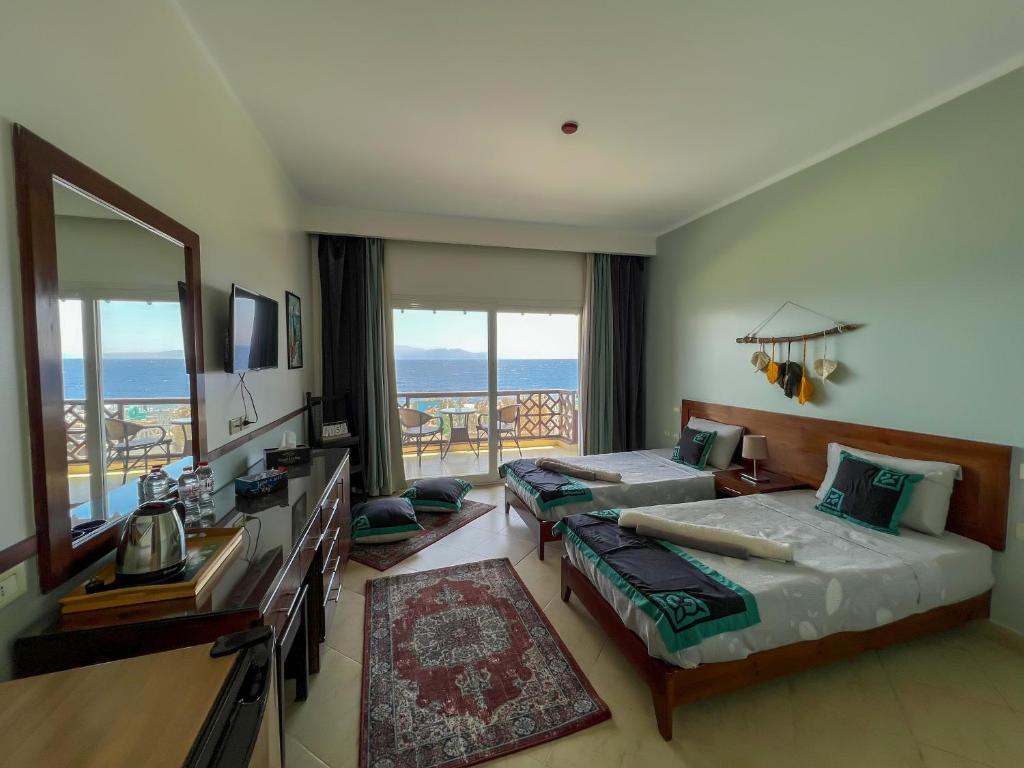 TV a/nebo společenská místnost v ubytování Club Red Dahab Motel