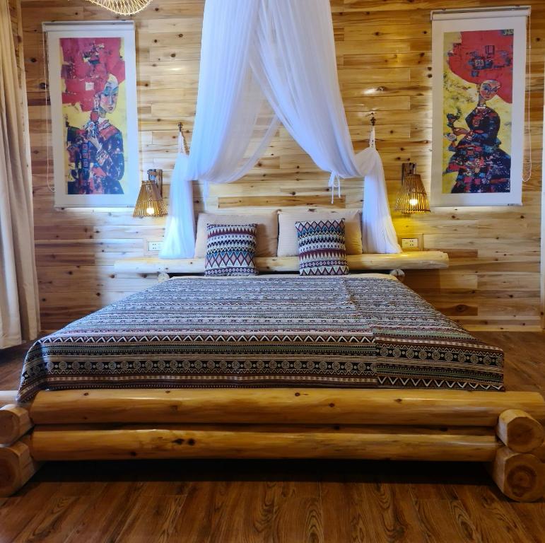 Postel nebo postele na pokoji v ubytování D&D Eco Sapa