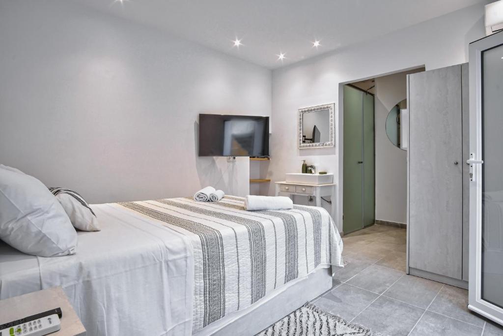 Llit o llits en una habitació de Calypso Apt. Mandouki, Corfu