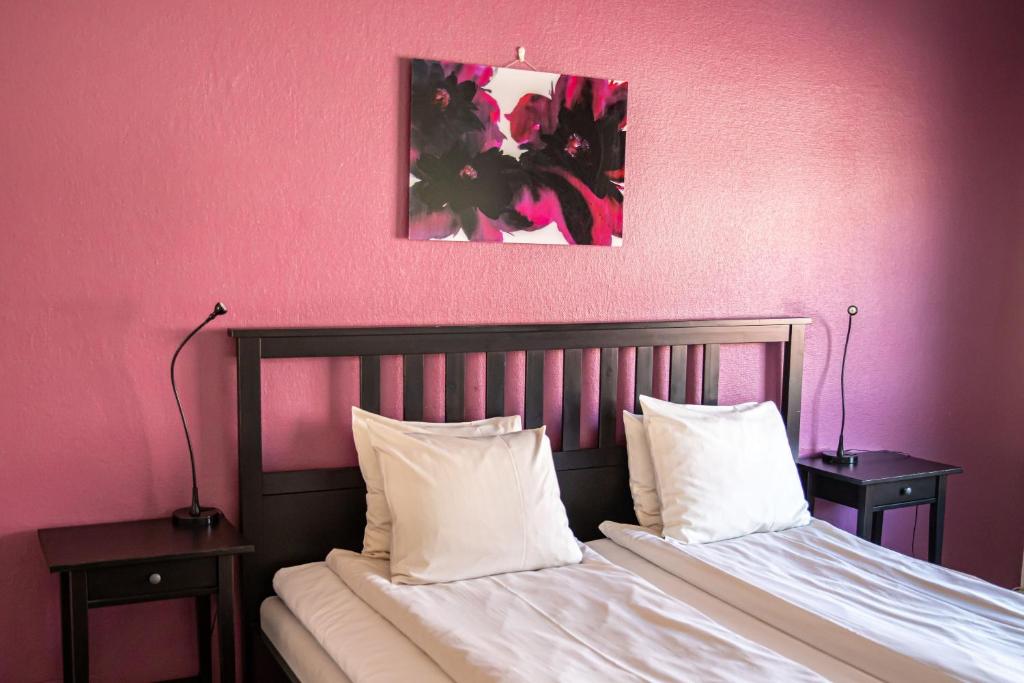 Postel nebo postele na pokoji v ubytování Saga Hotell