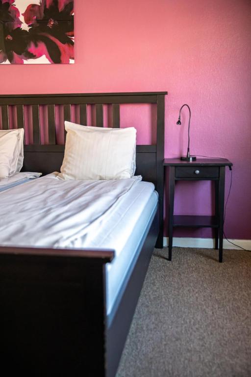Postel nebo postele na pokoji v ubytování Saga Hotell