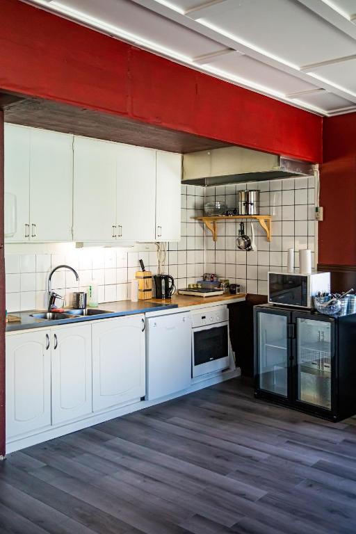 Kuchyň nebo kuchyňský kout v ubytování Saga Hotell