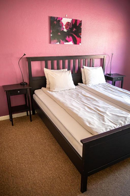 Postel nebo postele na pokoji v ubytování Saga Hotell