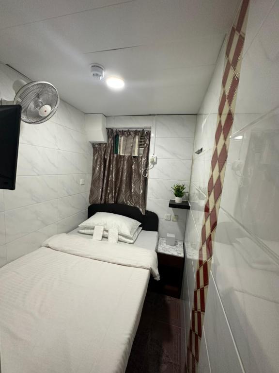Mandarin Guest House 객실 침대