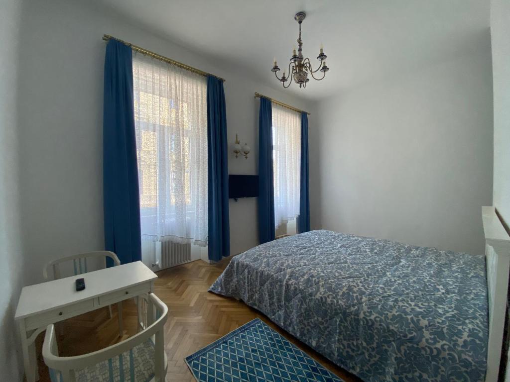 Postel nebo postele na pokoji v ubytování Klimtsuites