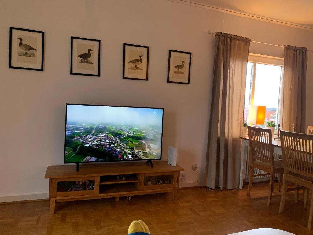 a living room with a flat screen tv at 4 Bed Apartment with balcony in Karlskrona in Karlskrona
