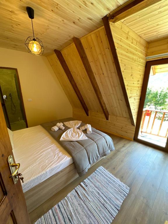 Postel nebo postele na pokoji v ubytování Royal Land