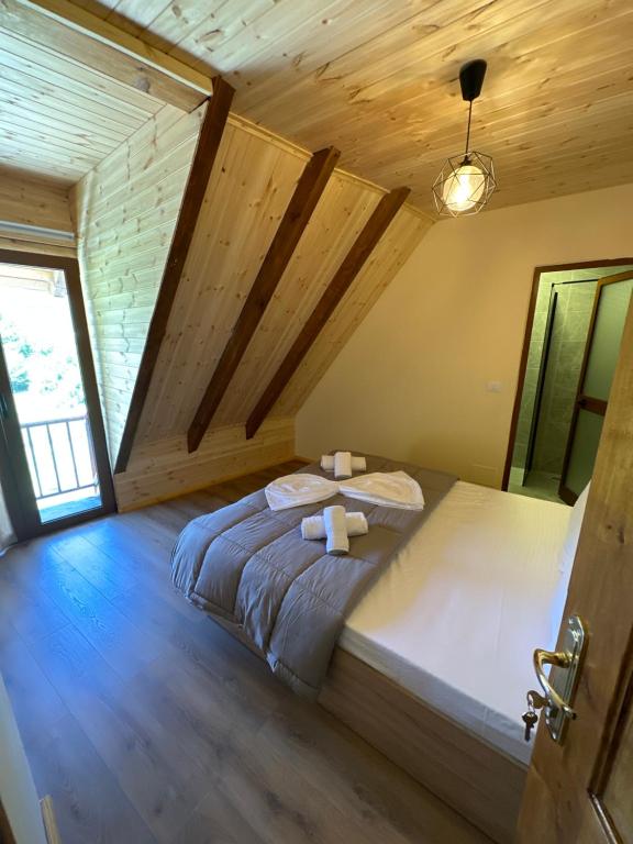 Postel nebo postele na pokoji v ubytování Royal Land