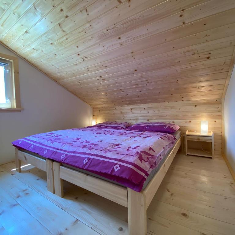 Postel nebo postele na pokoji v ubytování Chata Pod kaplí