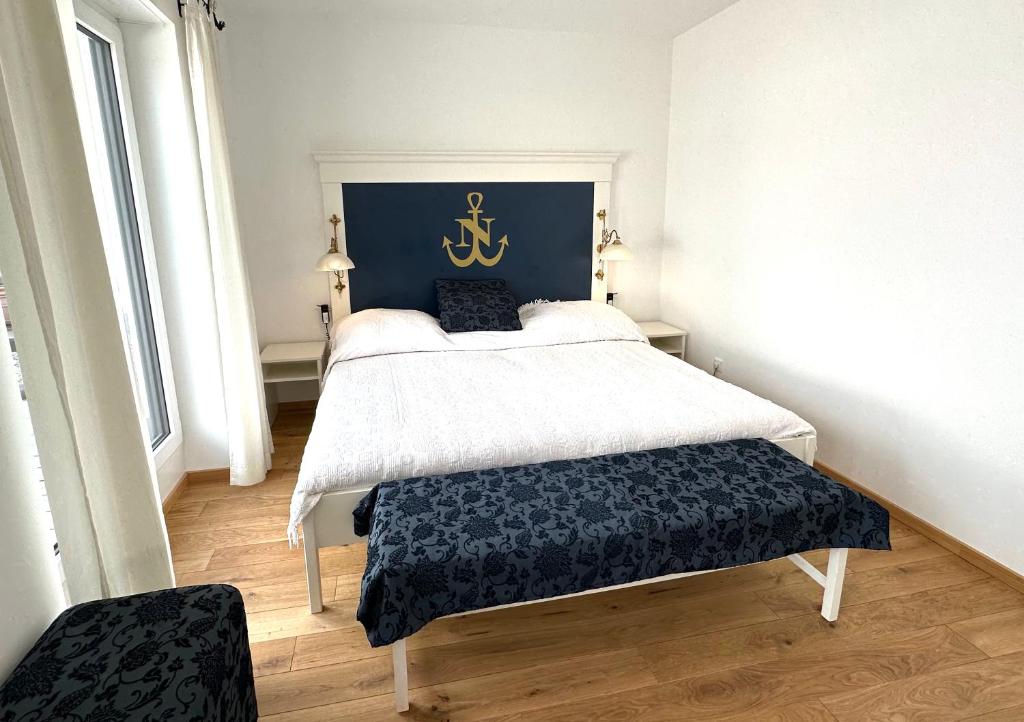 Postel nebo postele na pokoji v ubytování Anker Penthouse
