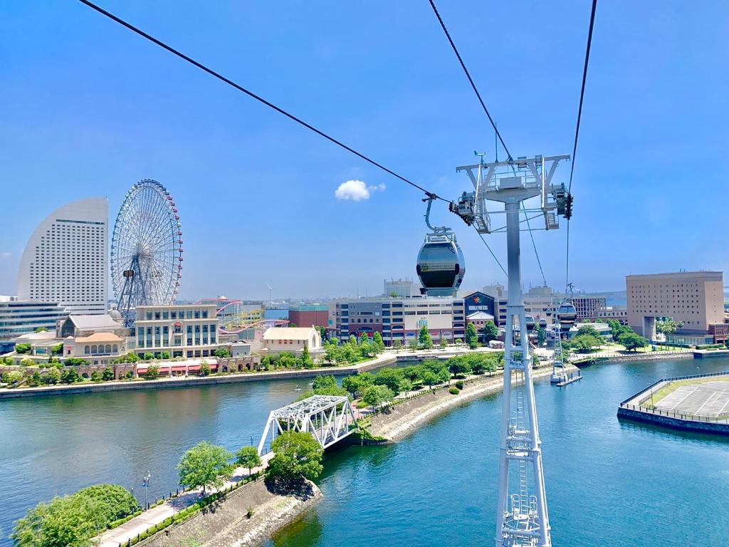 a gondola ride over a river in a city at Richmond Hotel Yokohama-Bashamichi in Yokohama