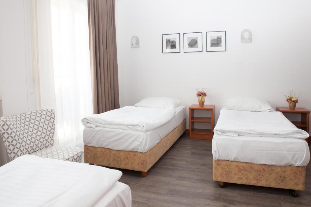 Postel nebo postele na pokoji v ubytování Sabotin, Hotel & Restaurant