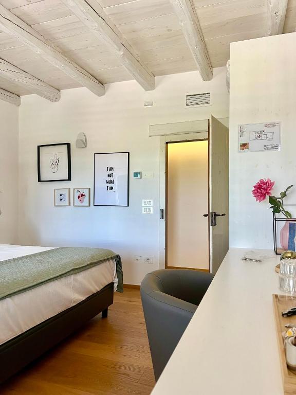 Postel nebo postele na pokoji v ubytování B&B La Corte Dei Vizi
