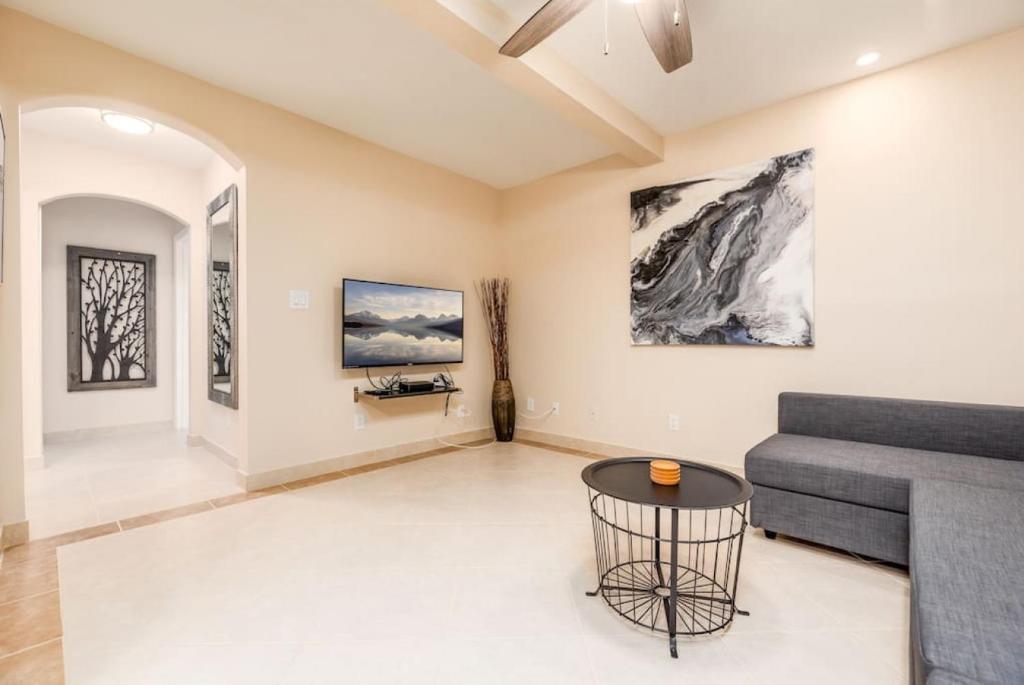 a living room with a couch and a table at Ocean Flats 1 - Lauderdale-by-the-Sea in Fort Lauderdale