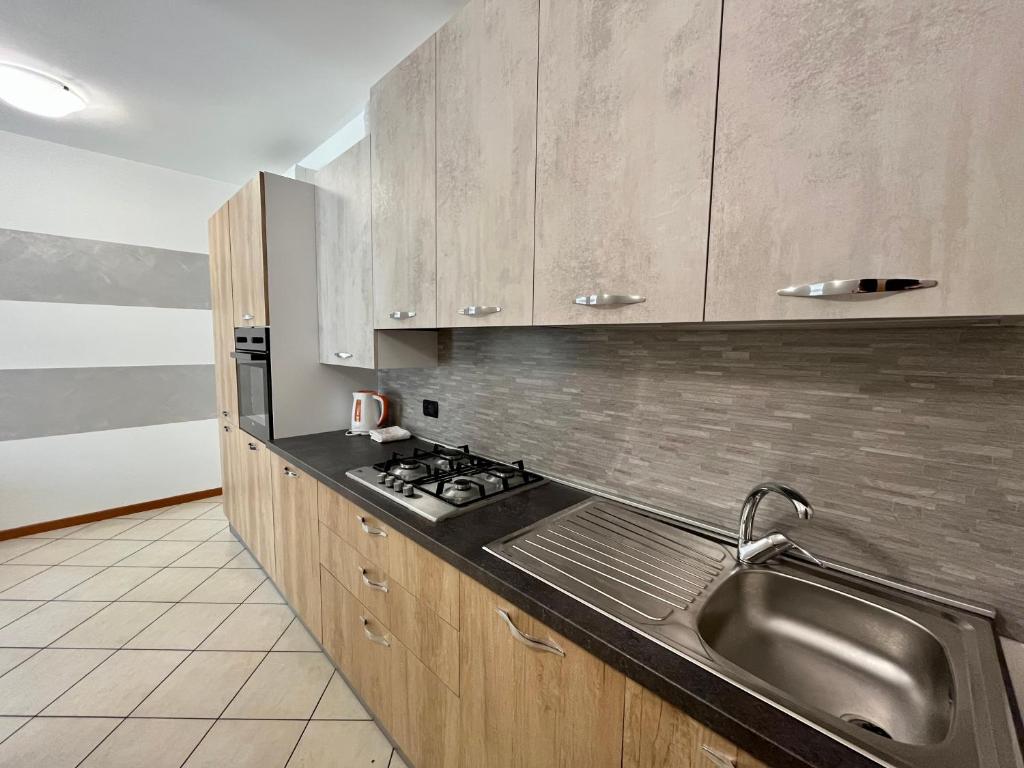 Kuchyň nebo kuchyňský kout v ubytování Residence la Lucciola
