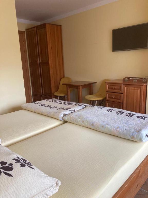 Posteľ alebo postele v izbe v ubytovaní Pod Delfinem Rewal