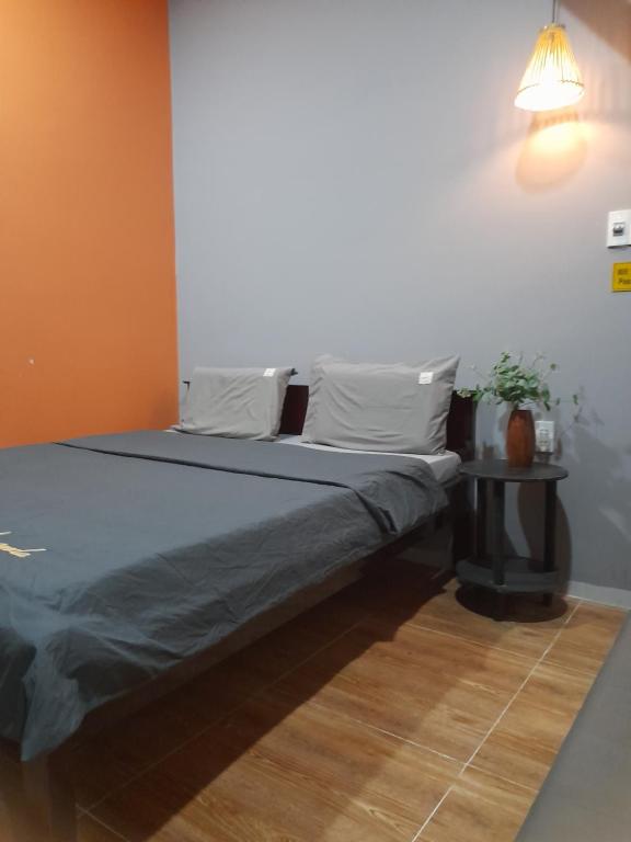 Postel nebo postele na pokoji v ubytování Thanh Hằng Homestay