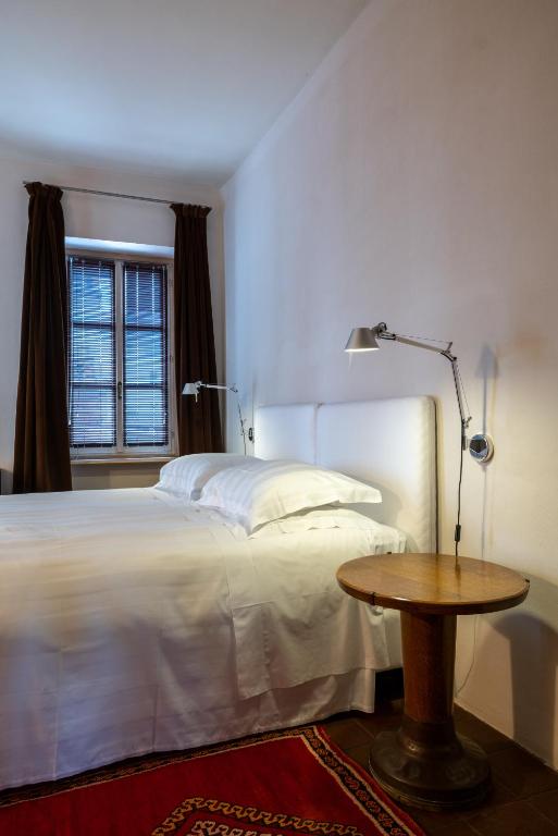 Postel nebo postele na pokoji v ubytování Casa del Pingone