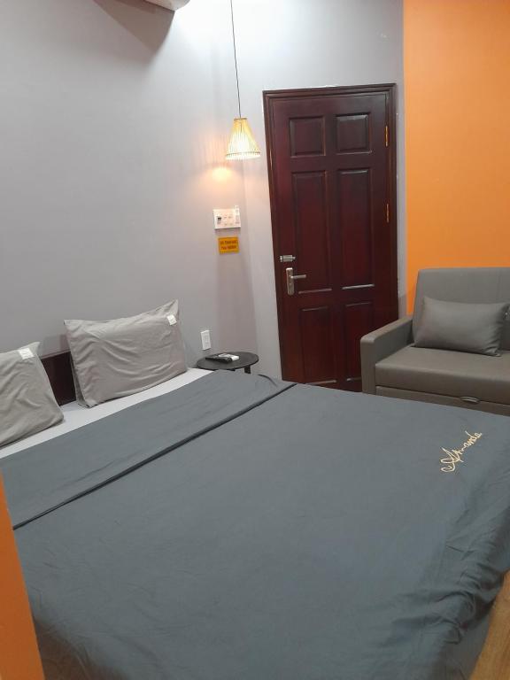 Postel nebo postele na pokoji v ubytování Thanh Hằng Homestay