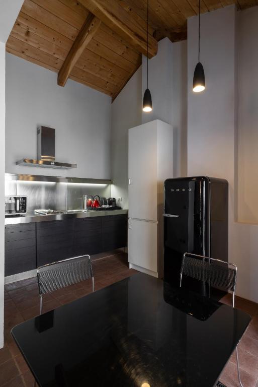 Kuchyň nebo kuchyňský kout v ubytování Casa del Pingone
