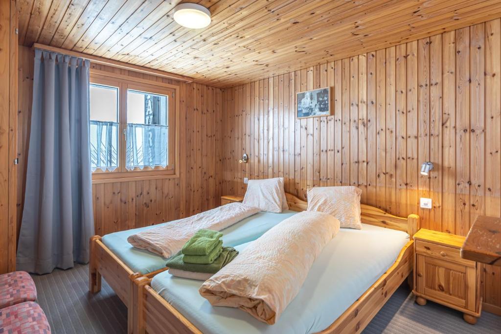 Postel nebo postele na pokoji v ubytování Appartmenthaus Bergfreund