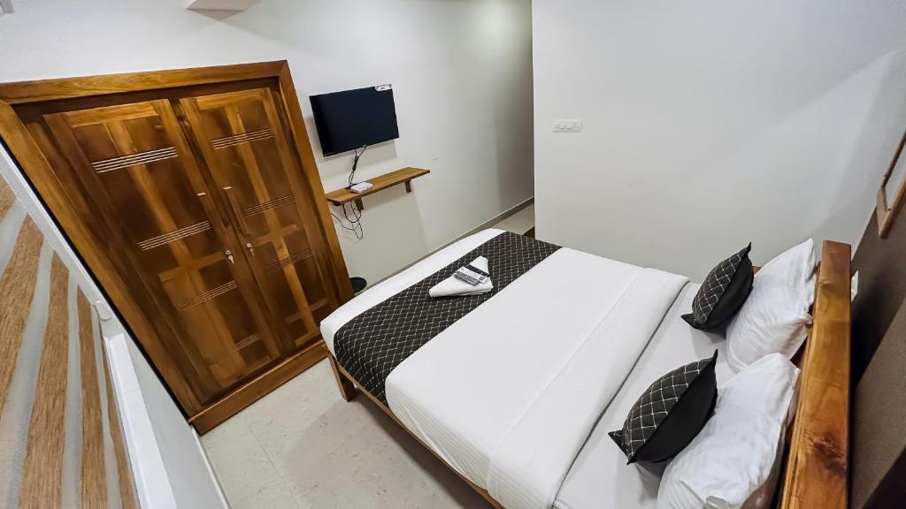 TV a/nebo společenská místnost v ubytování EMERALD INN