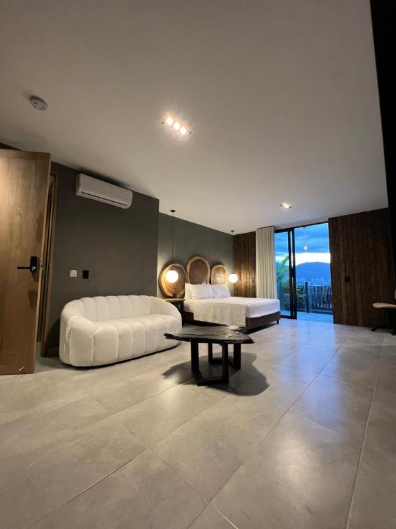 Postel nebo postele na pokoji v ubytování Hotel Zelva Negra