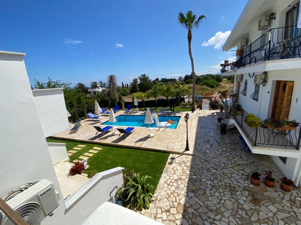 a view of a house with a swimming pool at Templos Homes in Kyrenia