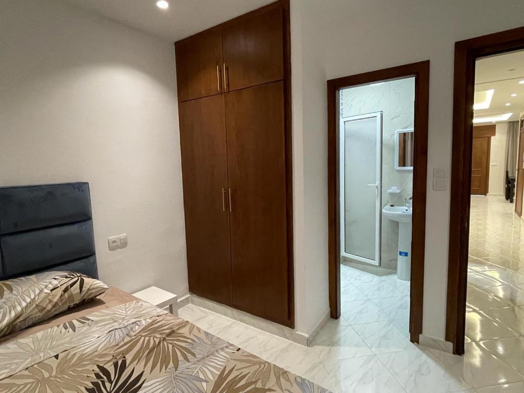 Postel nebo postele na pokoji v ubytování Residence Al-Bahr