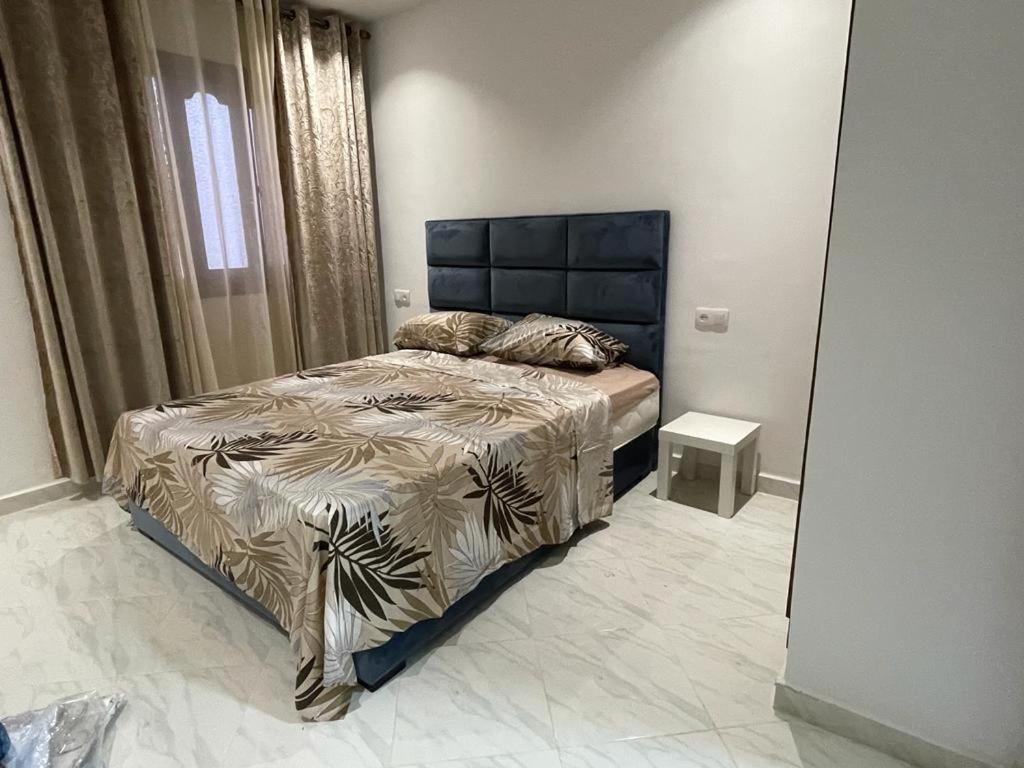 Postel nebo postele na pokoji v ubytování Residence Al-Bahr