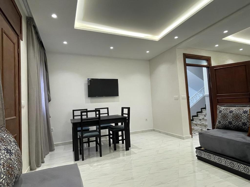 TV a/nebo společenská místnost v ubytování Residence Al-Bahr