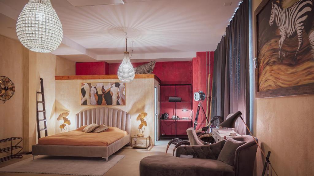 Postel nebo postele na pokoji v ubytování No1 Art B&B