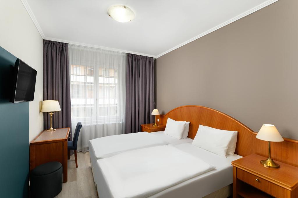 Voodi või voodid majutusasutuse Danubius Hotel Raba toas