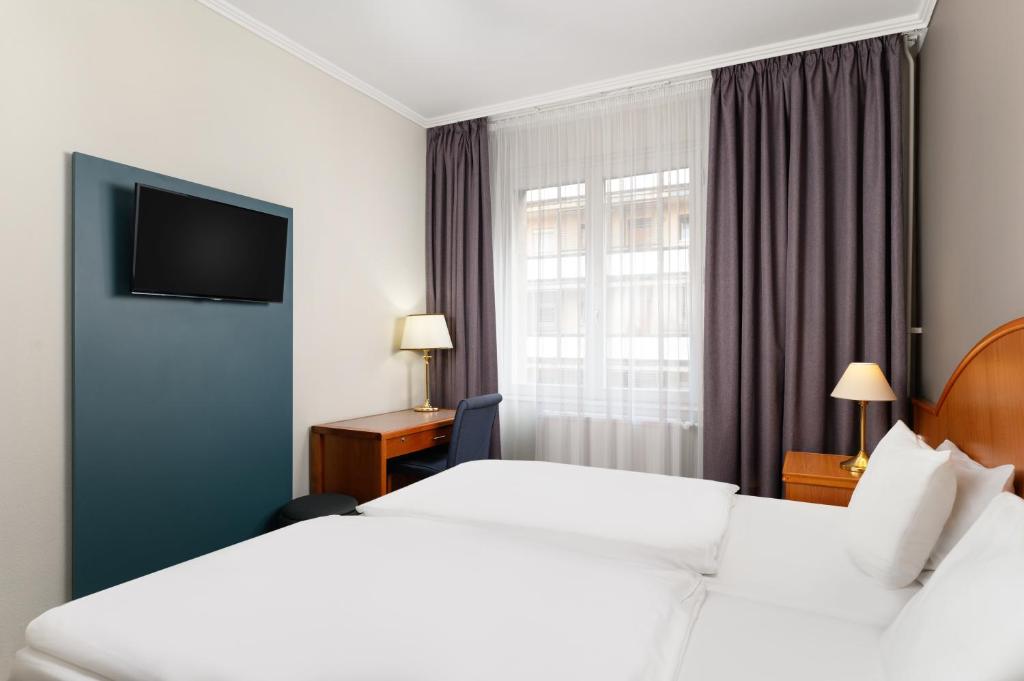 Voodi või voodid majutusasutuse Danubius Hotel Raba toas