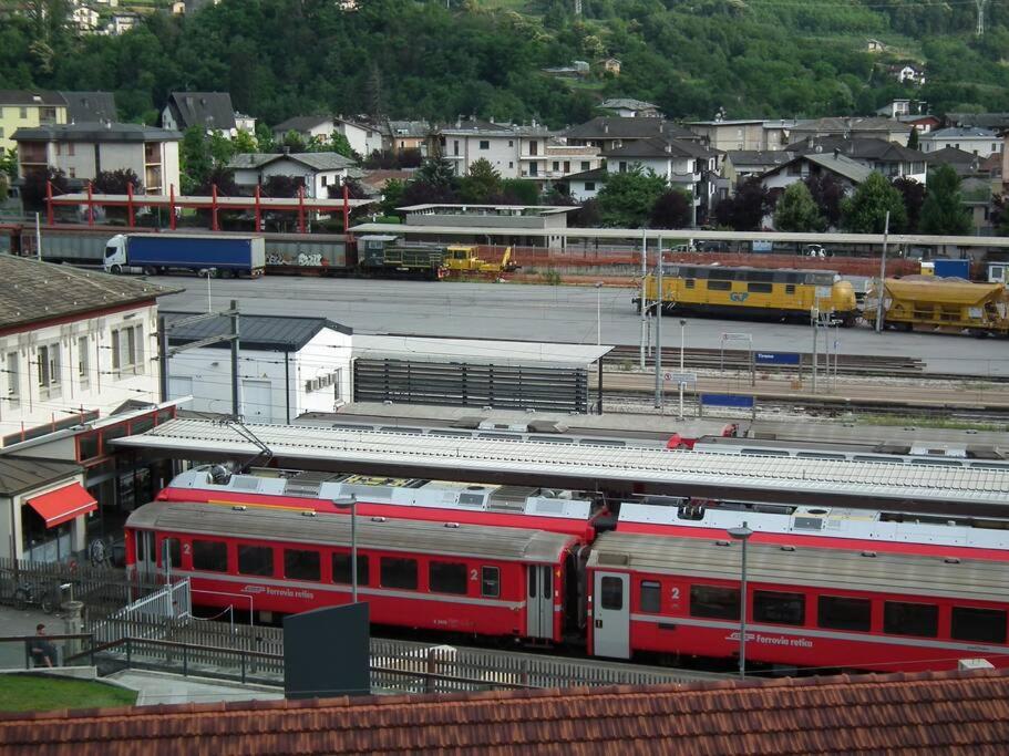 a group of trains parked at a train station at La casa di Giò in Tirano