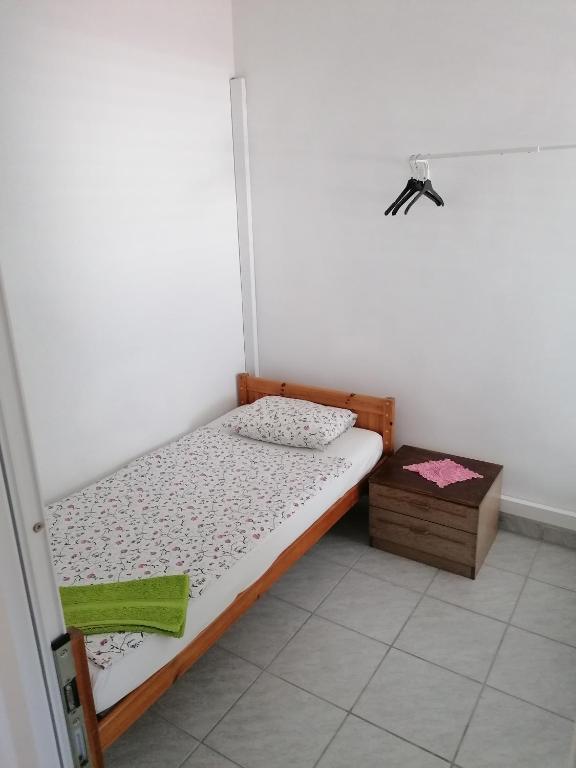 Posteľ alebo postele v izbe v ubytovaní Apartmani Marija i Josip