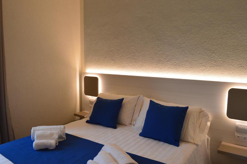 Postel nebo postele na pokoji v ubytování TANIT ROOMS & SPA