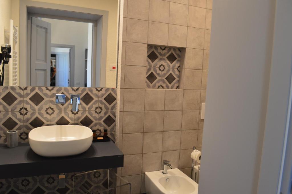 Koupelna v ubytování TANIT ROOMS & SPA